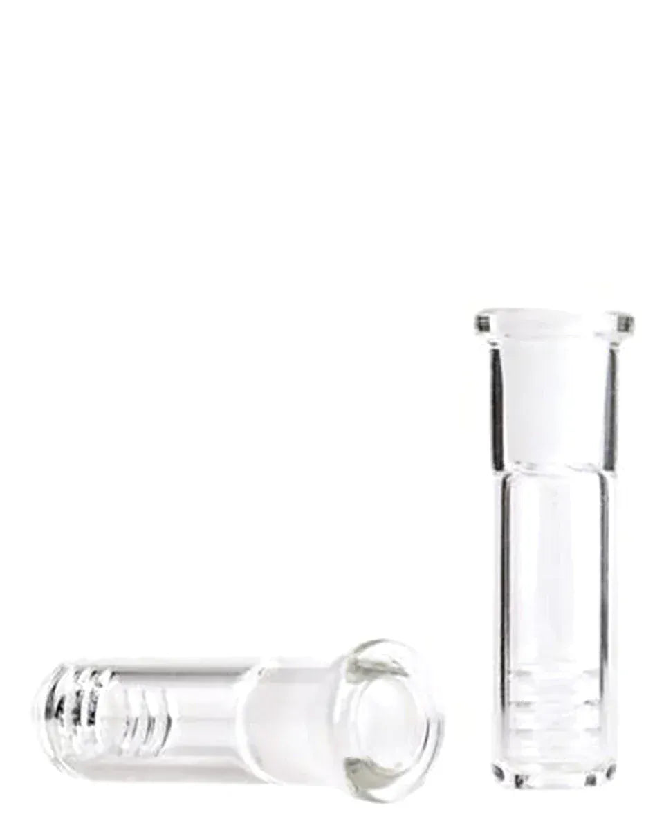 Close-up on a white background of two clear glass 18mm to 14mm Diffused Downstem - 2.5" pieces, one standing upright and one lying on its side.