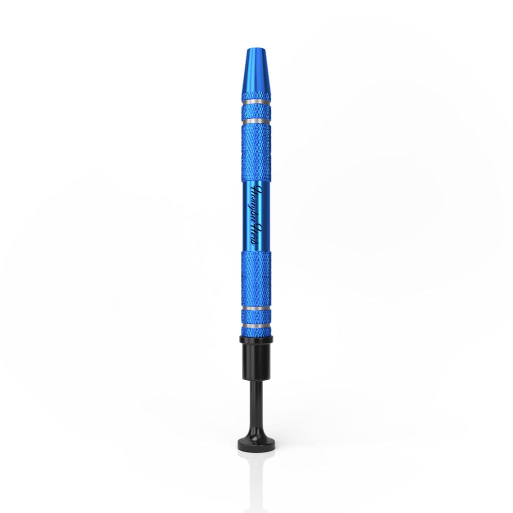 Centered vertical studio shot of the Honeybee Herb Dab Claw showing its textured metallic blue shaft and black base against a white background.