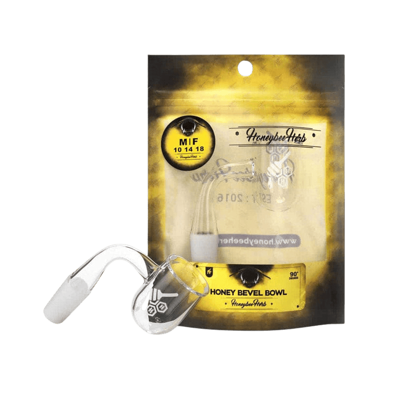 Angled close-up of the Honey Bevel Bowl Quartz Banger - 90° | Yellow Line sitting in front of its yellow-black branded pouch, shown from a slightly elevated side view.