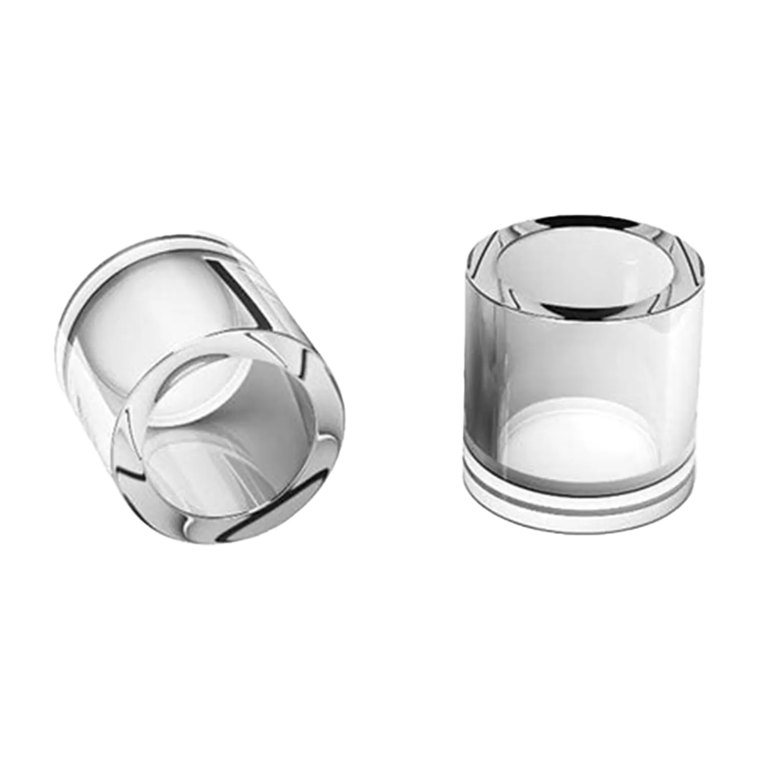 Two clear cylindrical Honey & Milk Cups shown on a white background, one standing upright and one lying on its side viewed at a slight angle.