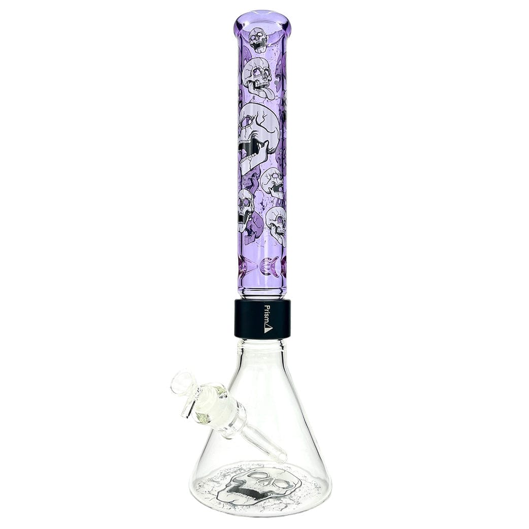 Front view of the Prism Prism Skull Beaker Single Stack showing a clear glass beaker base with a printed skull inside and a tall purple skull-patterned neck.