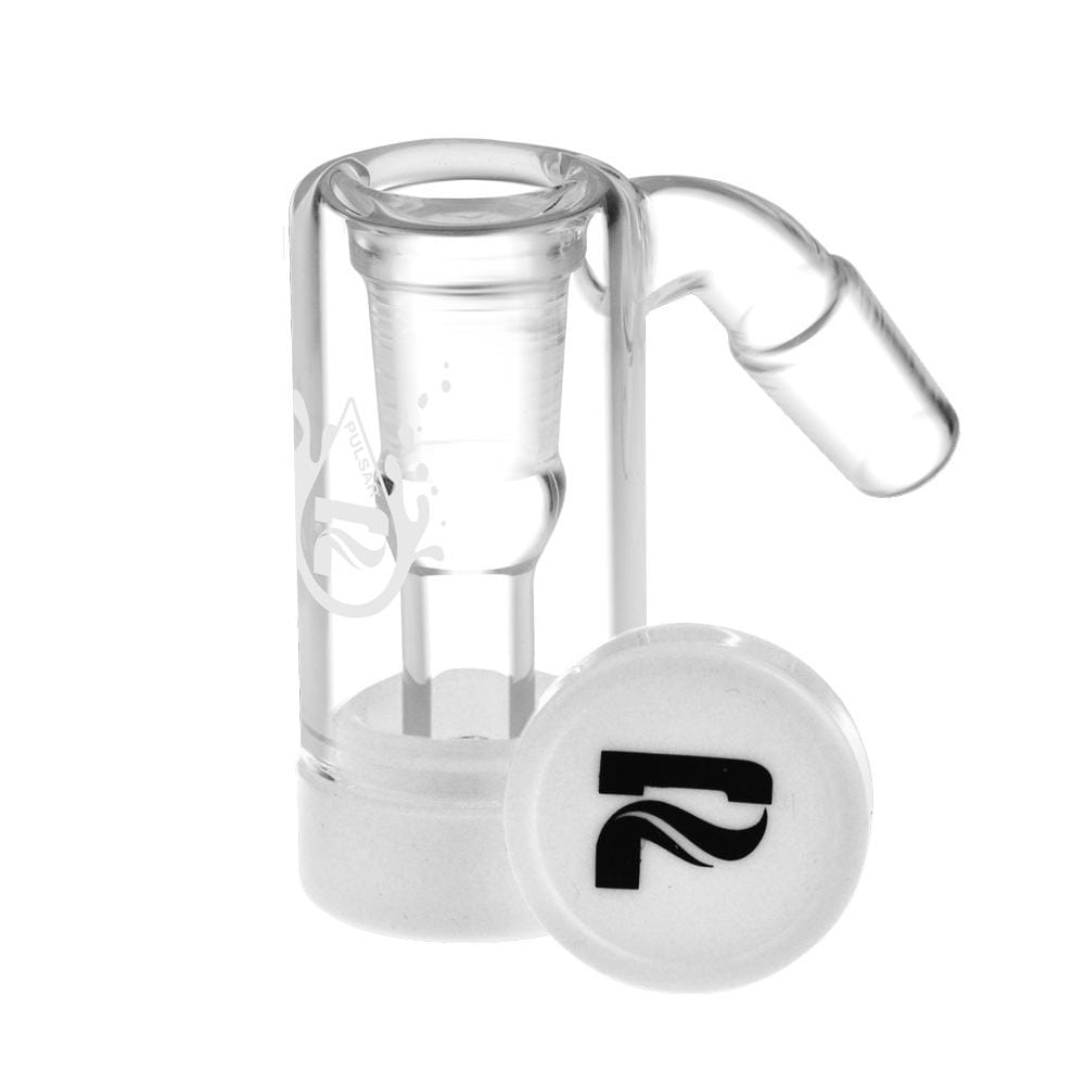 Close-up, three-quarter view of the clear Pulsar Oil Reclaimer | 45 Degree / 14Mm Male / 14Mm Female showing its cylindrical chamber, angled joint, and white silicone cap with a black logo.