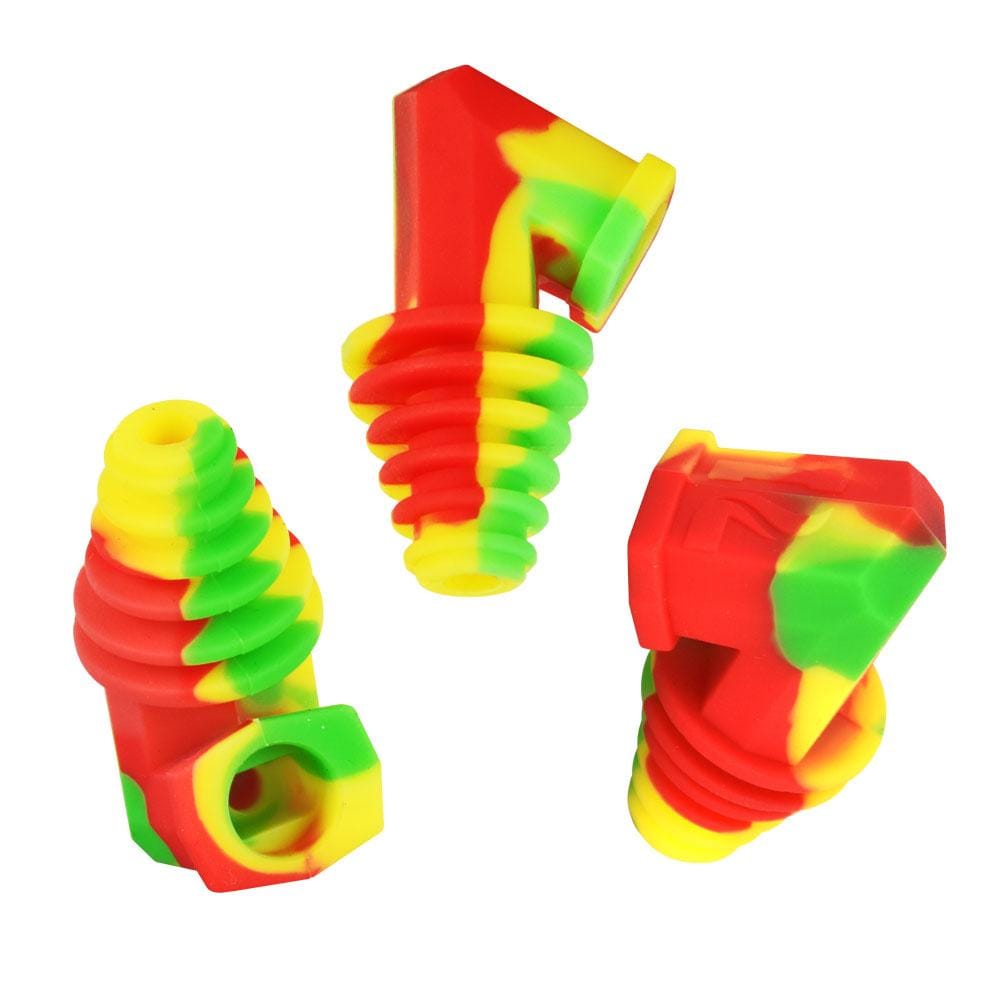 Three-quarter top view of three brightly marbled Pulsar Silicone Cart Rig Adapter pieces in red, yellow, and green against a white background.