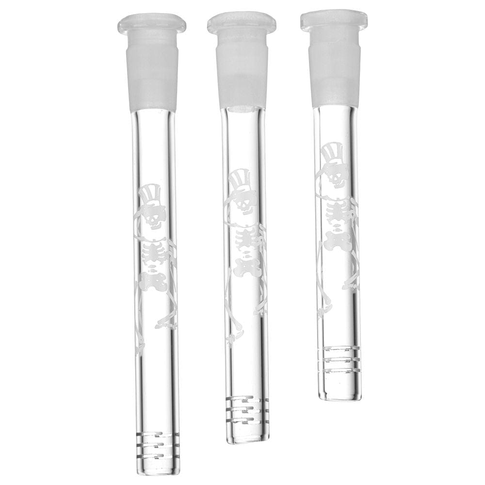 Three vertical clear glass downstems shown front-on against a white background, each engraved with a dancing skeleton motif on the Pulsar 12Ct Display - Grateful Dead X Pulsar Glass Downstem - 14Mm F / Dancing Skeletons.