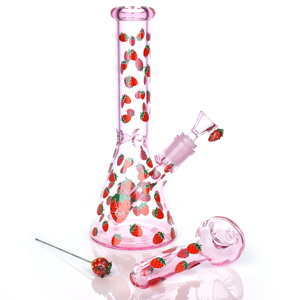 Studio-lit front view of the Pulsar Fruit Series Strawberry Cough Herb Pipe Glow Duo - 10" / 14Mm F in pink glass dotted with red strawberry decals.