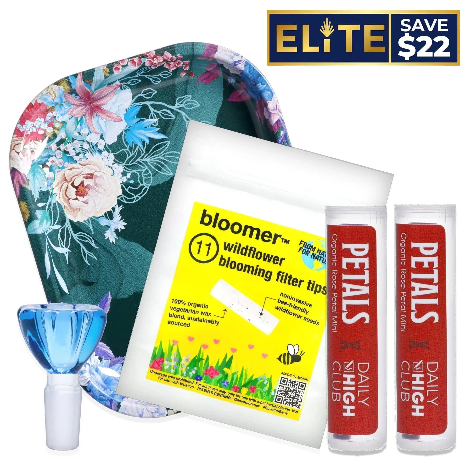 Angled close-up of the Flower Power Combo showing a floral-printed green tray, white pouch with a yellow wildflower label, and two red PETALS tubes.