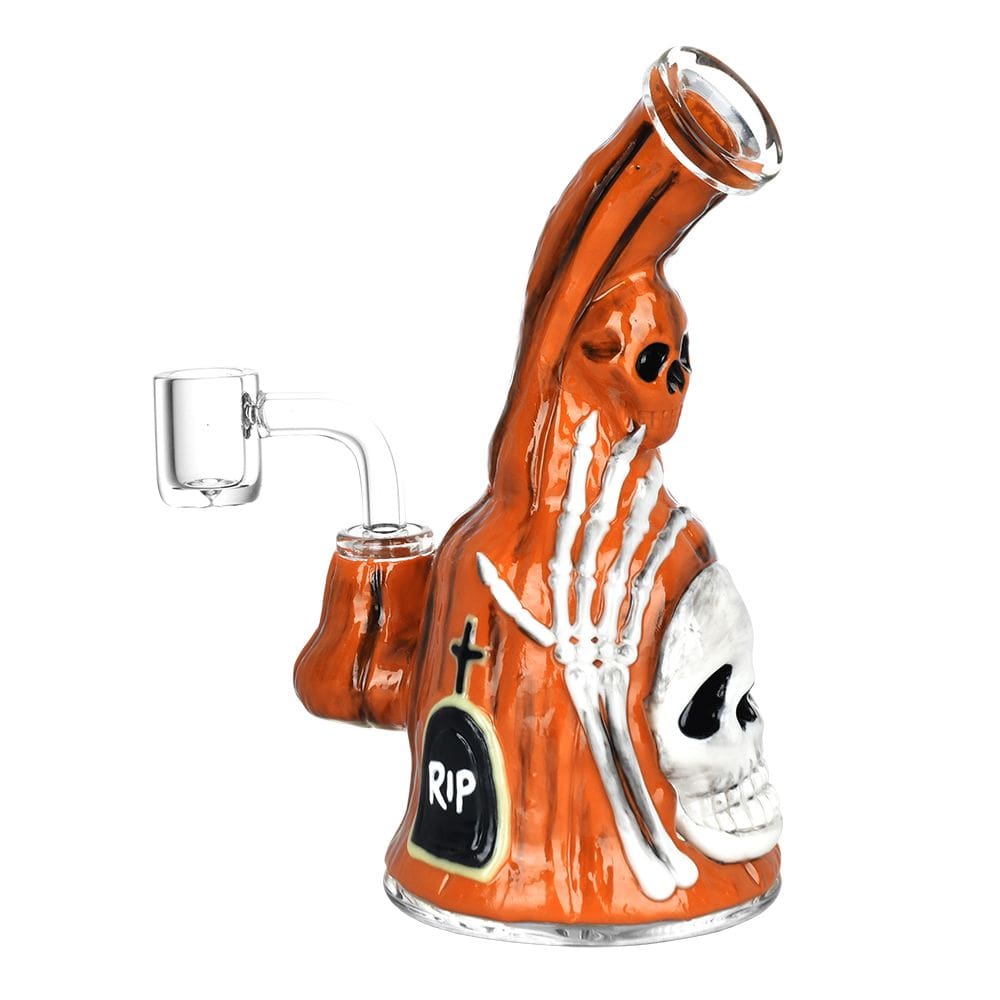 A three-quarter view of the Haunted Gourd Enamel on Glass Dab Rig, featuring an orange gourd shape with enamel detailing.
