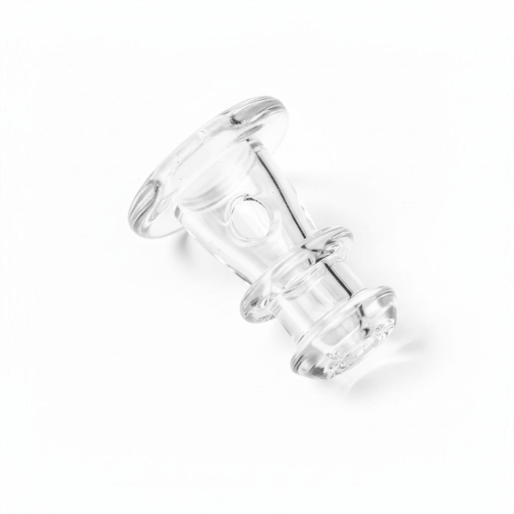 Angled close-up of the clear Empire Glassworks PuffCo 'New Peak' & Proxy Glass Joystick Cap showing its flared top, hollow center hole, and stacked ring details.