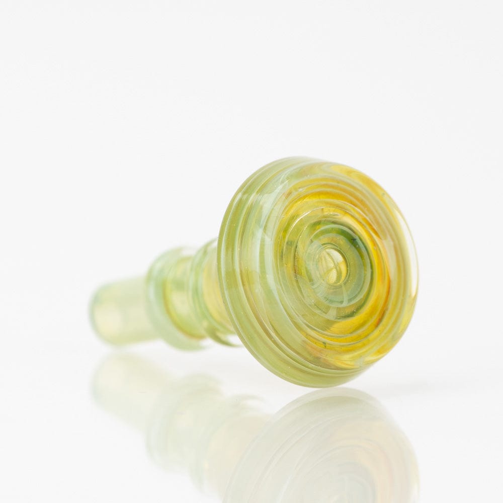 A close-up, angled view of the PuffCo Peak Pro 3D XL Chamber Glass Joystick Cap, reflecting light on its smooth surface.