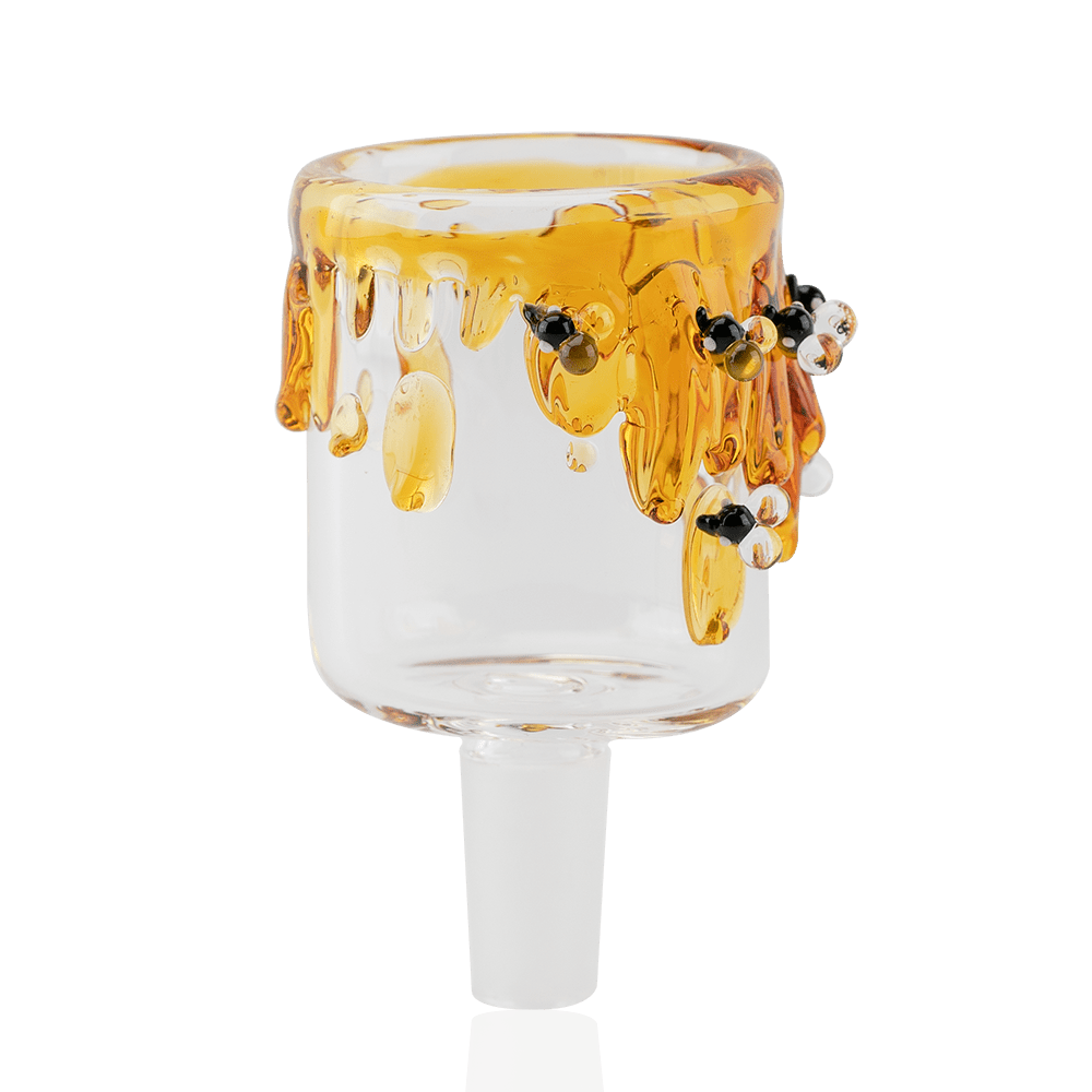 A close-up, angled view of the Bee PuffCo Proxy 14m Glass Attachment, featuring amber-colored glass with decorative bubble accents.