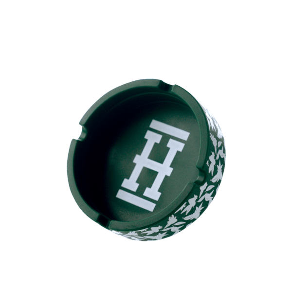 Overhead view of the Asher "Cannaflage" Silicone Ashtray, displaying a circular, patterned design on a plain white background.