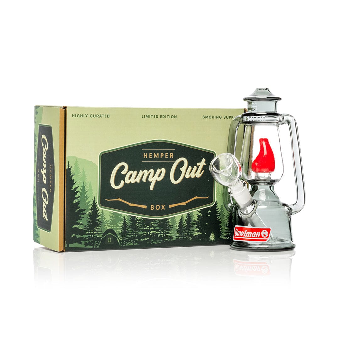 A slightly angled shot of the 7-inch Bowlman Lantern Bong, resembling a vintage oil lamp with a clear glass body.