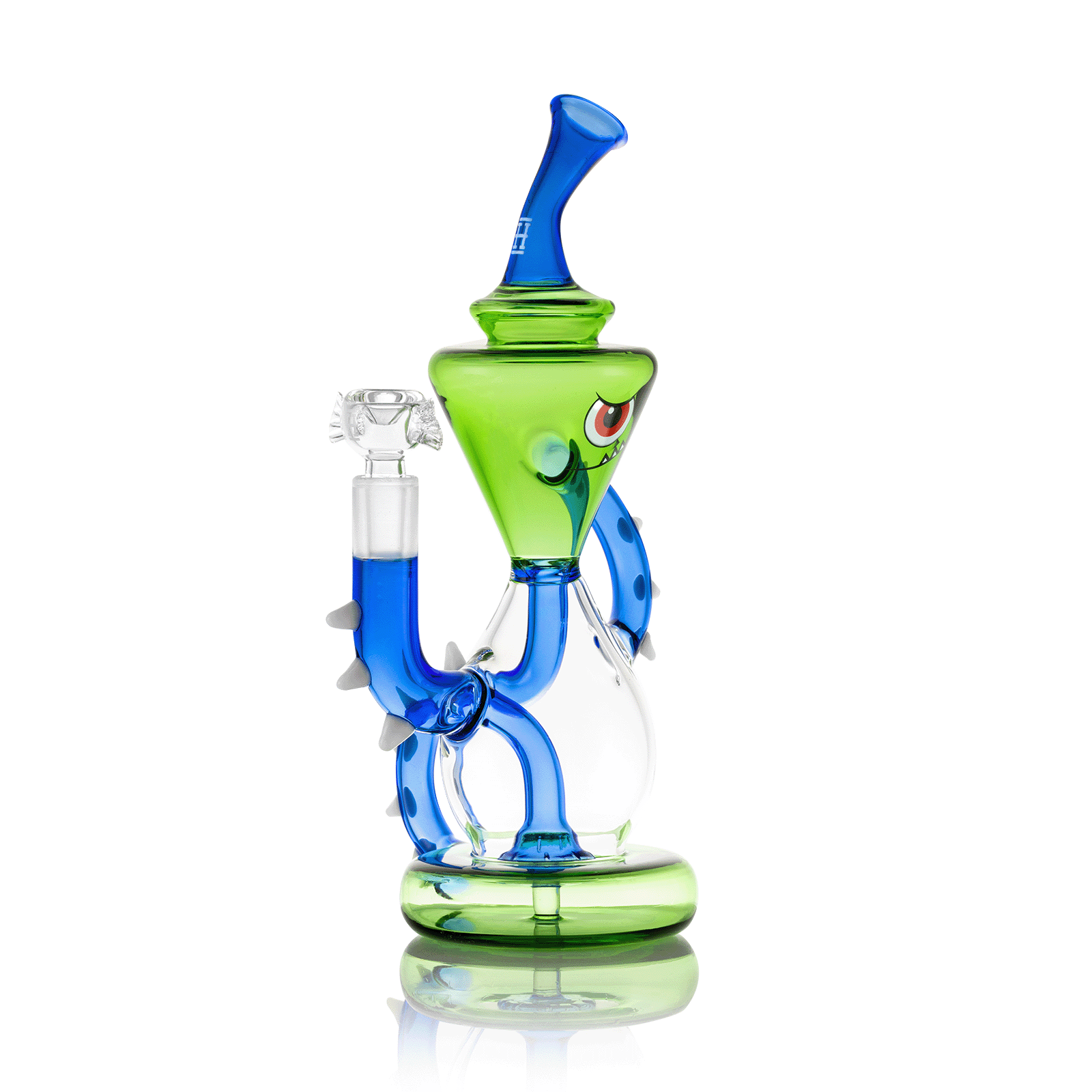 Three-quarter view of the Candy Monster XL Bong 9" showing its green monster-shaped chamber with a painted eye and slanted blue mouthpiece against a white background