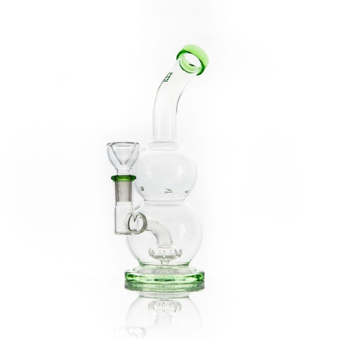 A studio shot of the Tornado Vortex Rig, showing its clear glass construction and unique, swirling design from a low angle.