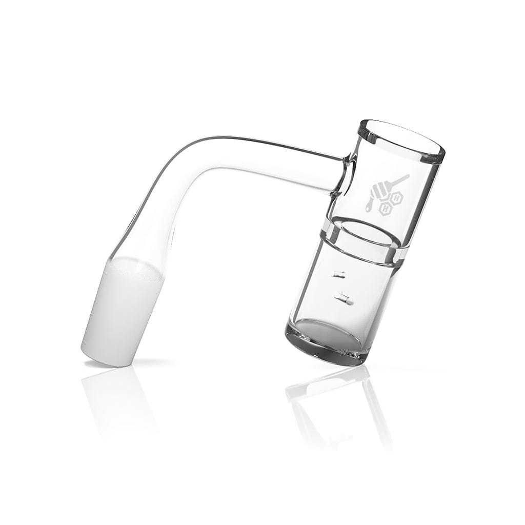 Angled close-up of the clear HONEY WELL QUARTZ BANGER - 90° DEGREE | YL showing its 90-degree neck and cylindrical bucket with subtle logo and reflective white background