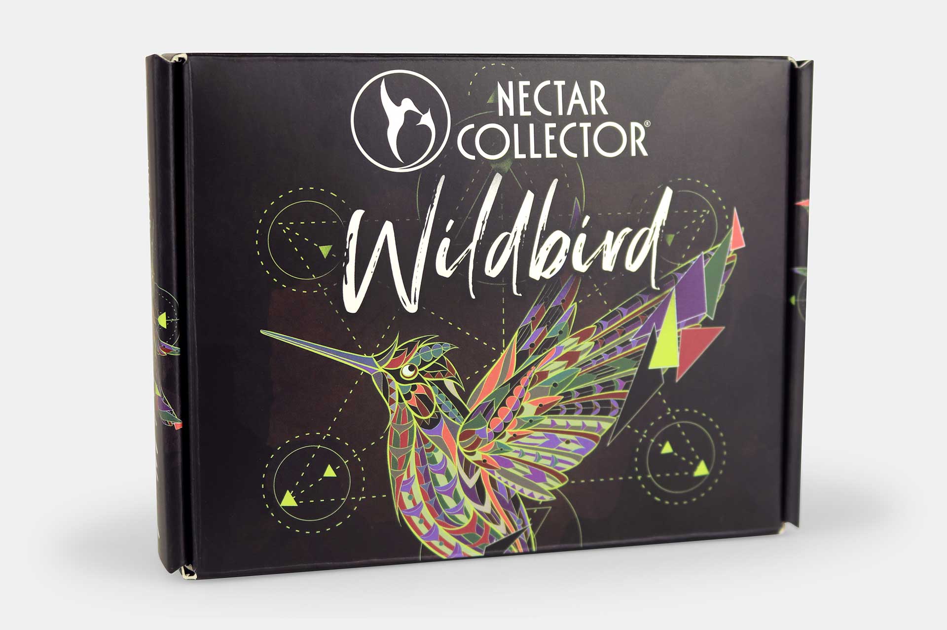 Angled front view of the Nectar Collector Wildbird Kit box showing a colorful geometric hummingbird illustration and bold white logo on a dark background