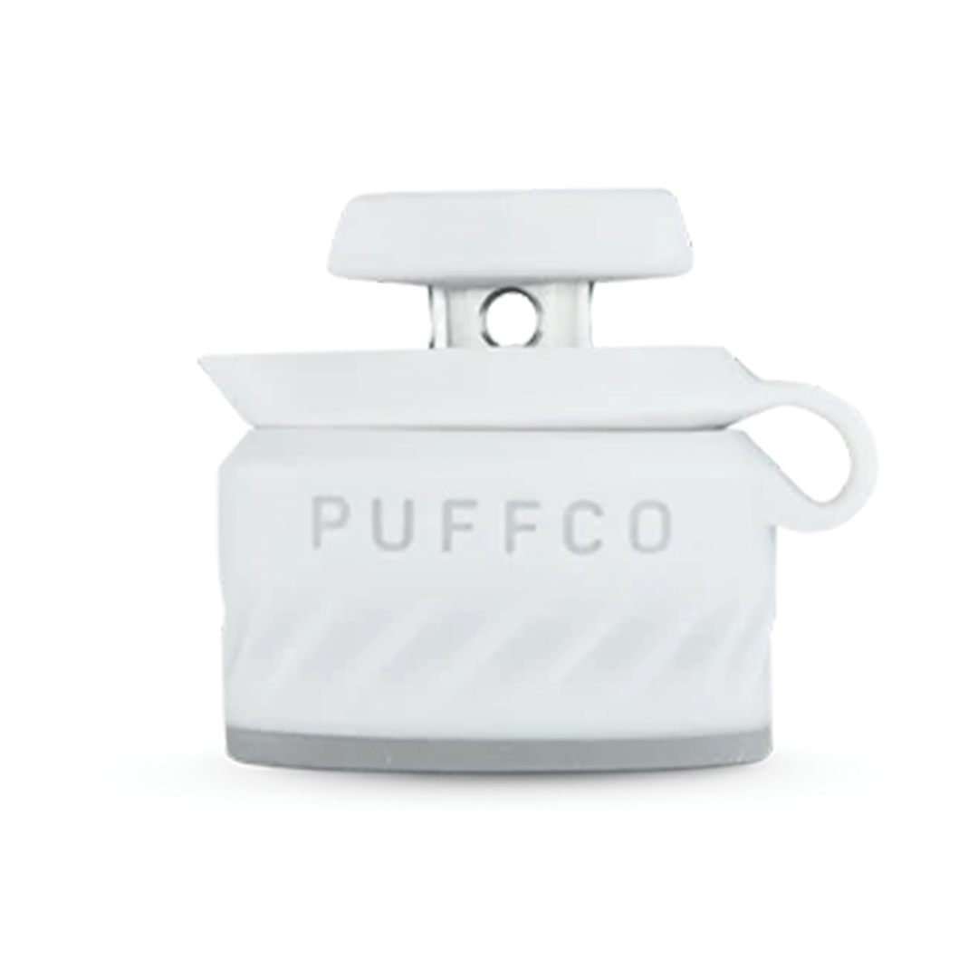 Centered front view of the Onyx Puffco Peak Pro Joystick Cap showing its rectangular top, looped side tab, and embossed "PUFFCO" face against a white background
