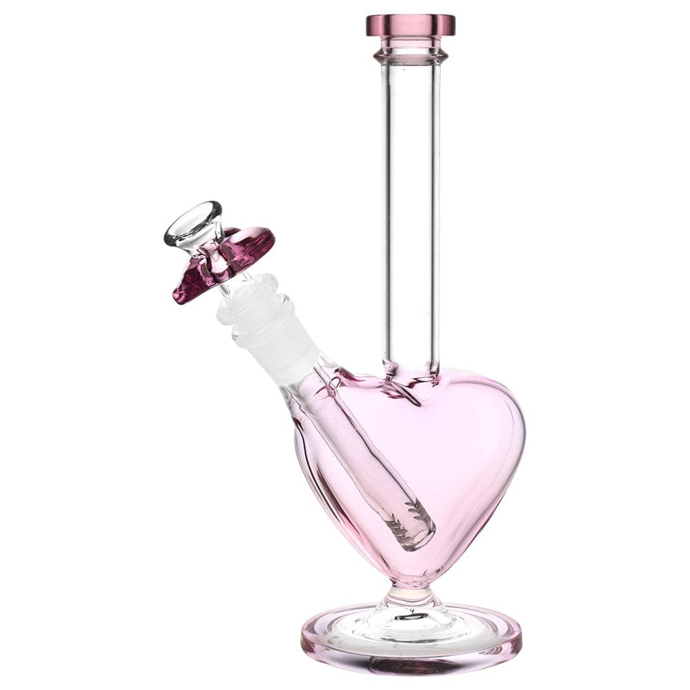 A three-quarter view of “The Heart Grows Fonder” 9” Glass Water Pipe, featuring a heart-shaped glass body with a clear finish.