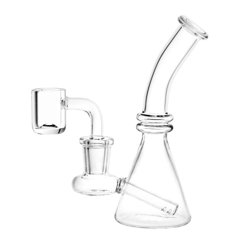 A close-up shot of the Clear Glass Mini Beaker Dab Rig, showing its clear glass construction and compact beaker shape.