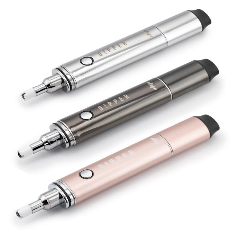 A close-up, angled view of The Dipper, showcasing its sleek, metallic body and clear glass tip.