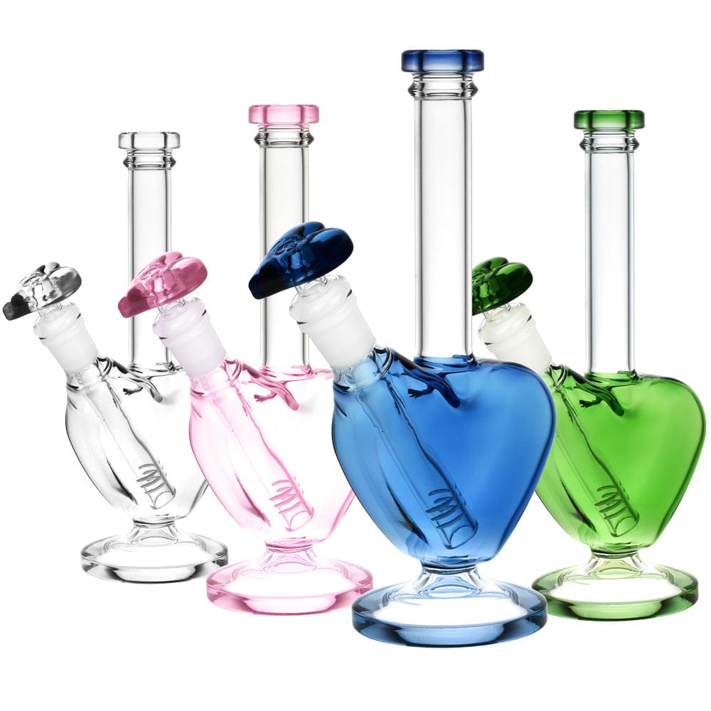 A brightly lit, angled view of three Love 9" Water Pipes in shades of pink, blue, and green, arranged side-by-side.