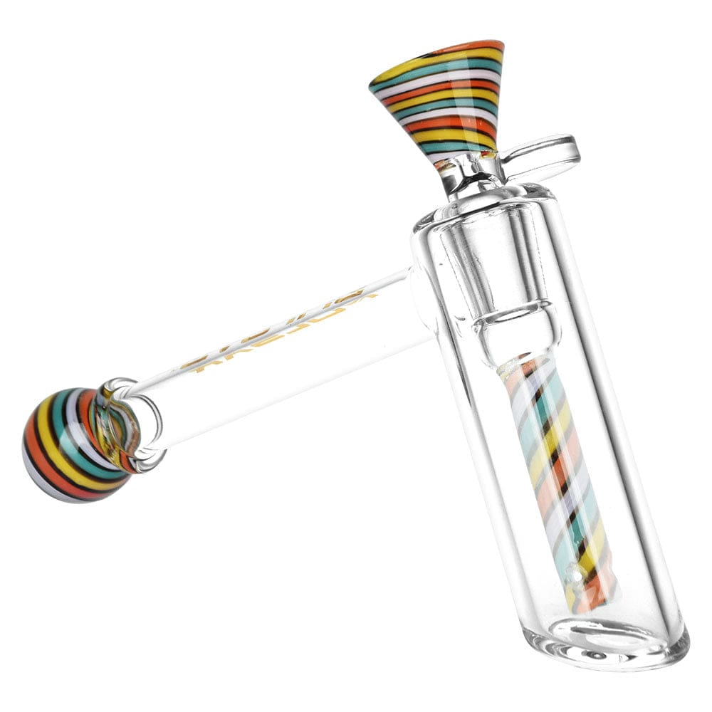 The Pulsar Retro Rave Wig Wag Bubbler w/ Herb Slide is shown in a side view, highlighting its colorful, patterned glass construction.
