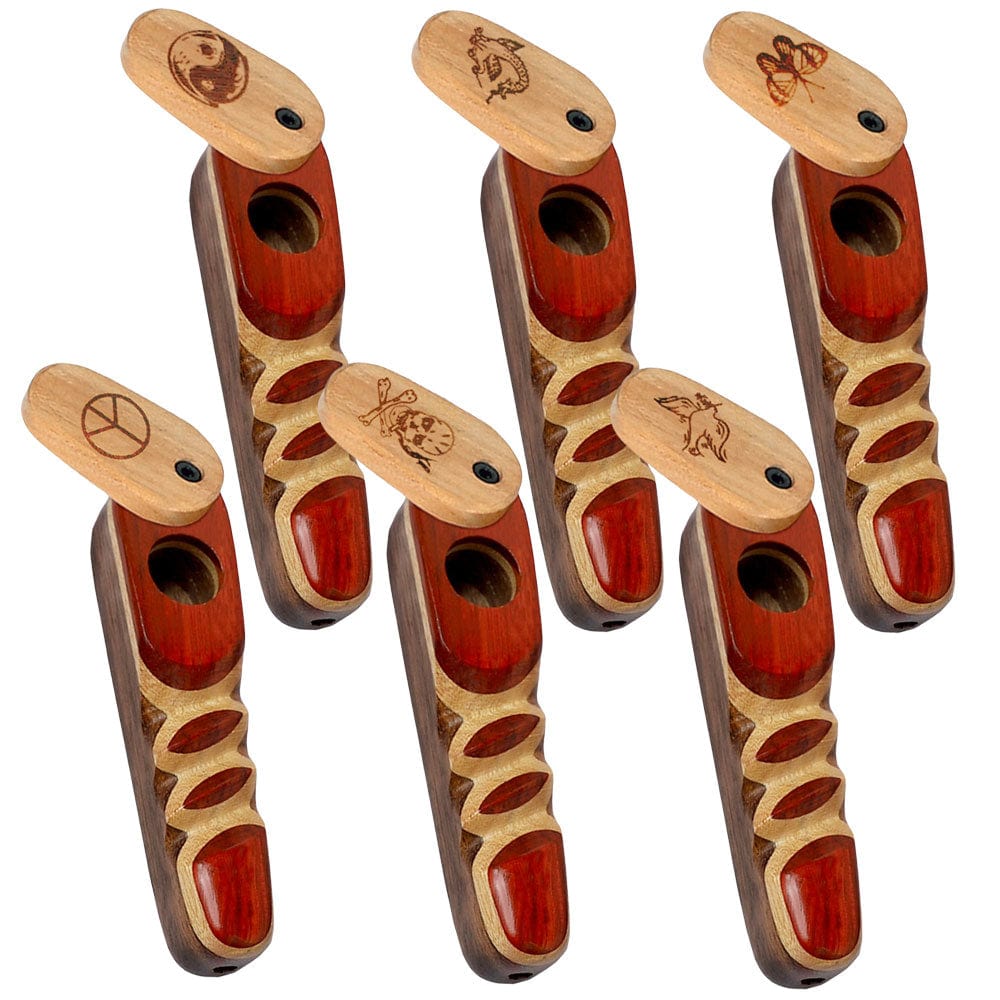 A close-up, angled view of the Wood Spoon Pipe w/ Engraved Swivel Lid, showcasing its detailed wood grain and patterned engraving.