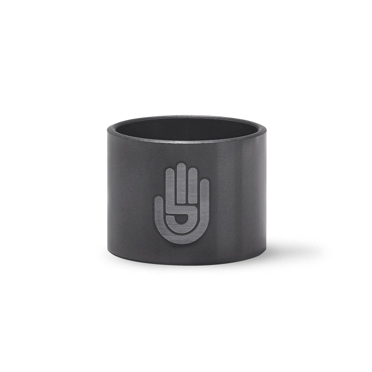Close-up of the Silicone Carbide Insert, a dark, cylindrical object presented against a neutral grey background.