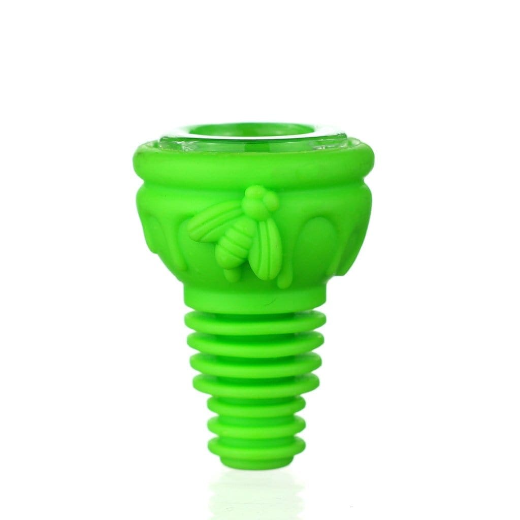 Close-up of The Unibowl Silicone Bowl, a textured, green silicone piece displayed against a bright white background.