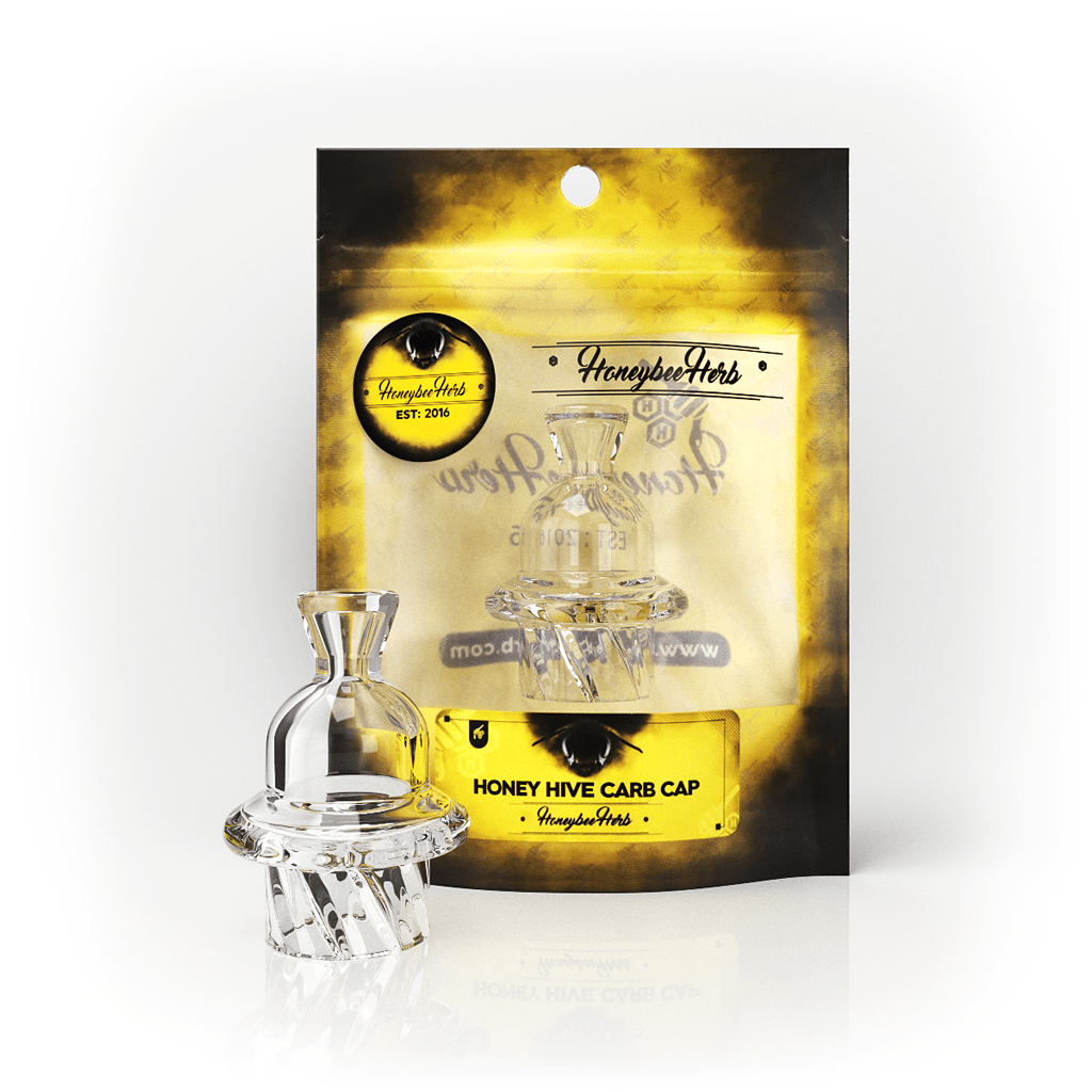 A close-up of the HONEY HIVE CARB CAP with a reflective surface and a branded label, shown against a dark background.