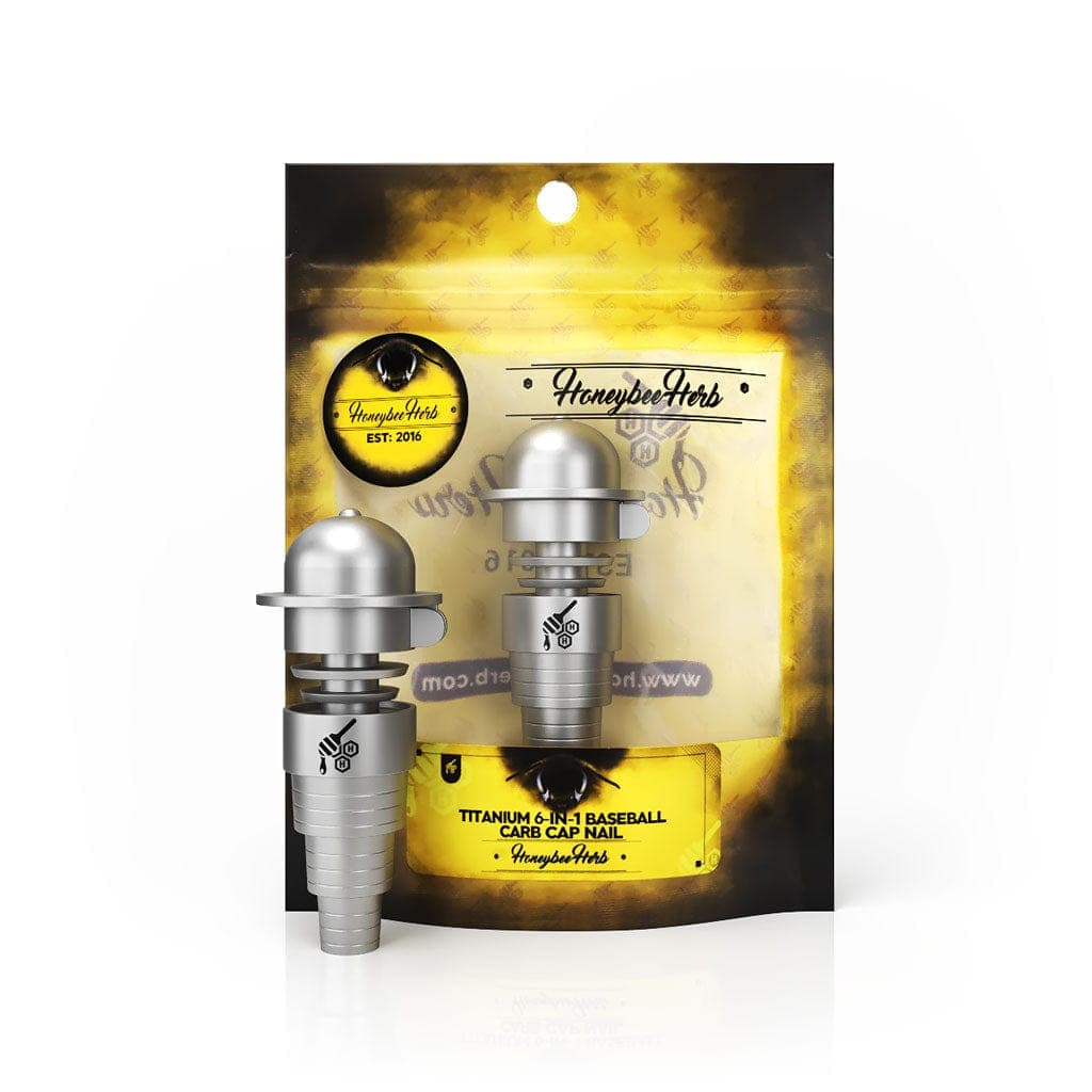 A close-up shot of the Honeybee Herb Titanium 6-in-1 Baseball Carb Cap Dab Nail, with visible branding on the side.
