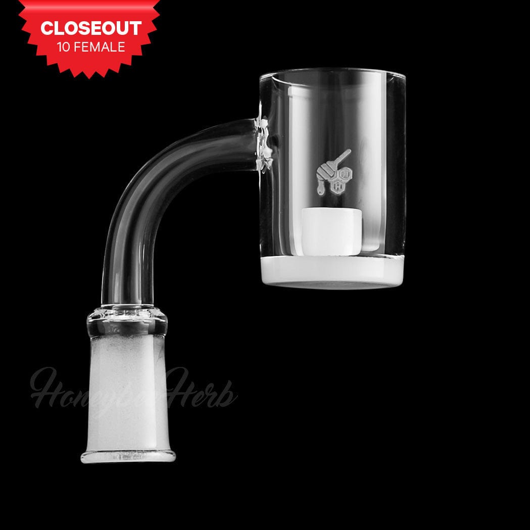 A close-up, angled view of the HONEY & MILK CORE REACTOR QUARTZ BANGER, showcasing its 90-degree design and clear quartz construction.