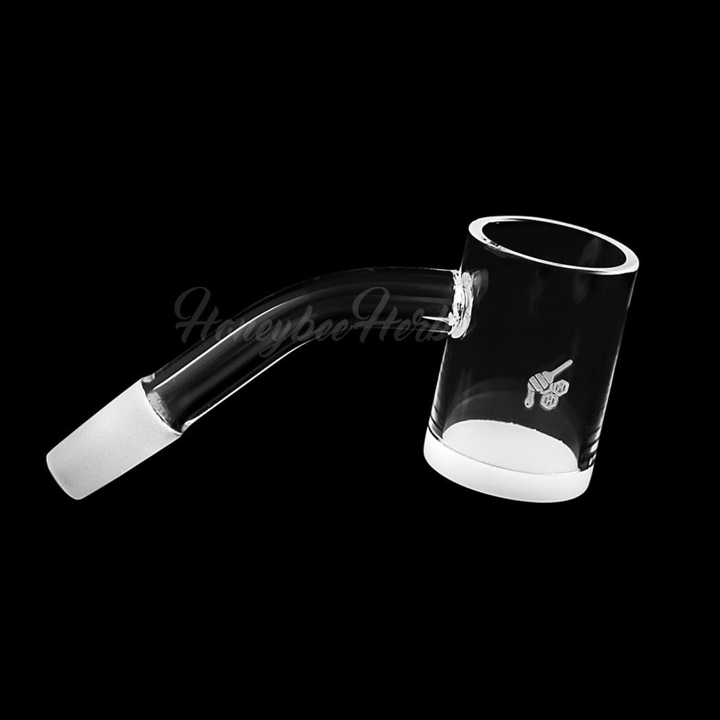 A 45-degree angle view of the HONEY & MILK QUARTZ BANGER, showcasing its clear glass construction and angled joint.