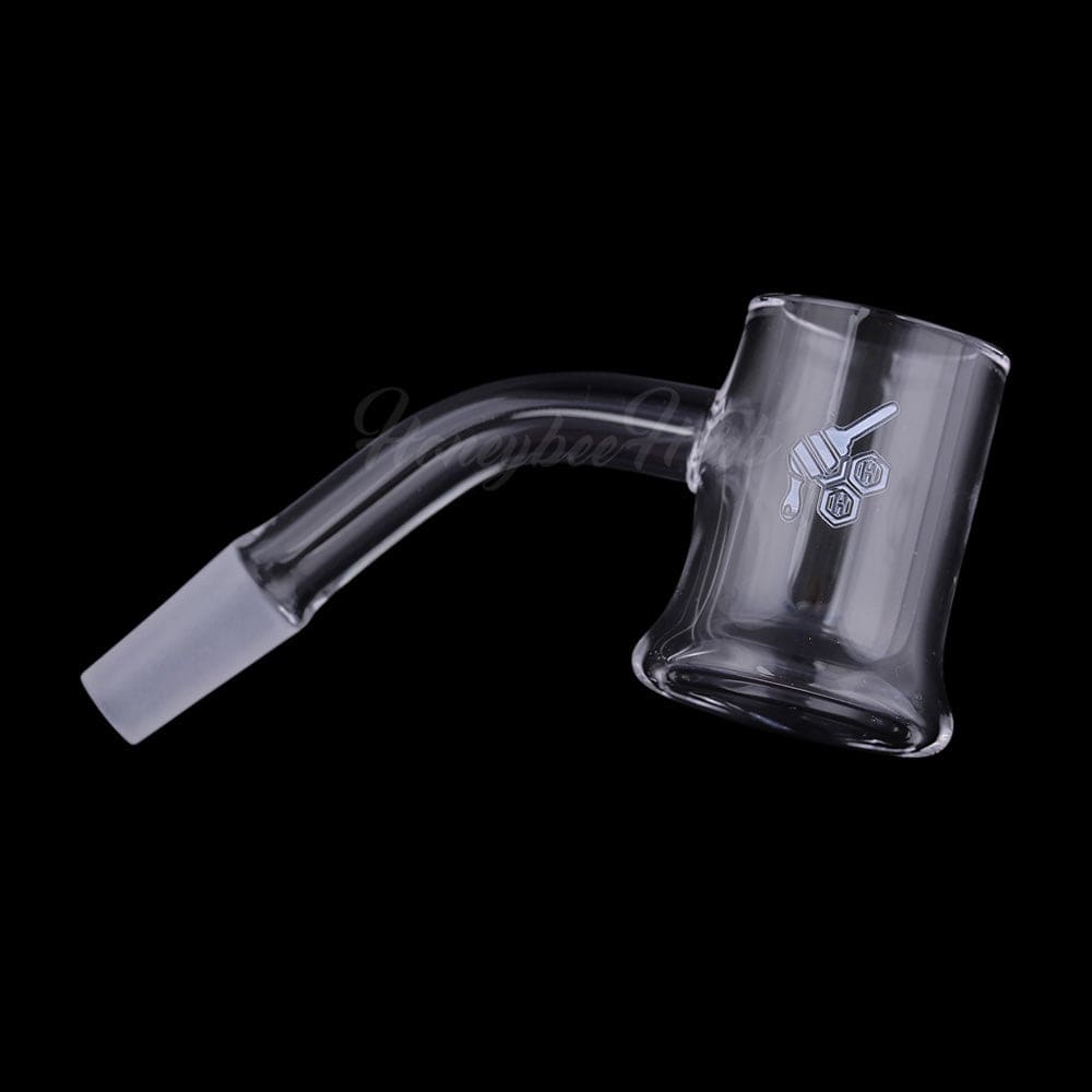 A 45-degree angled view of the HONEY MUG QUARTZ BANGER, showcasing its clear quartz construction and rounded shape.