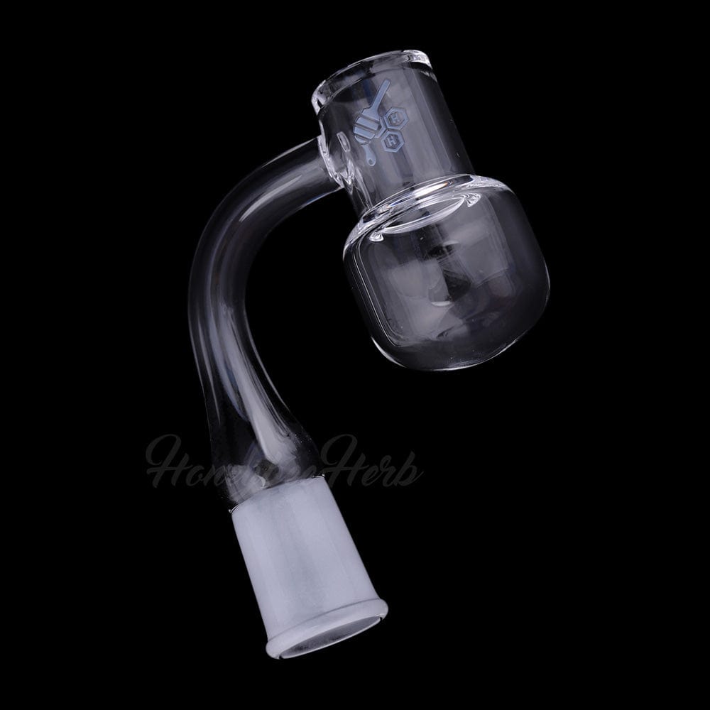 Angled close-up of the Honey Kettle Quartz Banger - 90° Degree | Yl showing its clear 90-degree joint and rounded quartz bucket against black