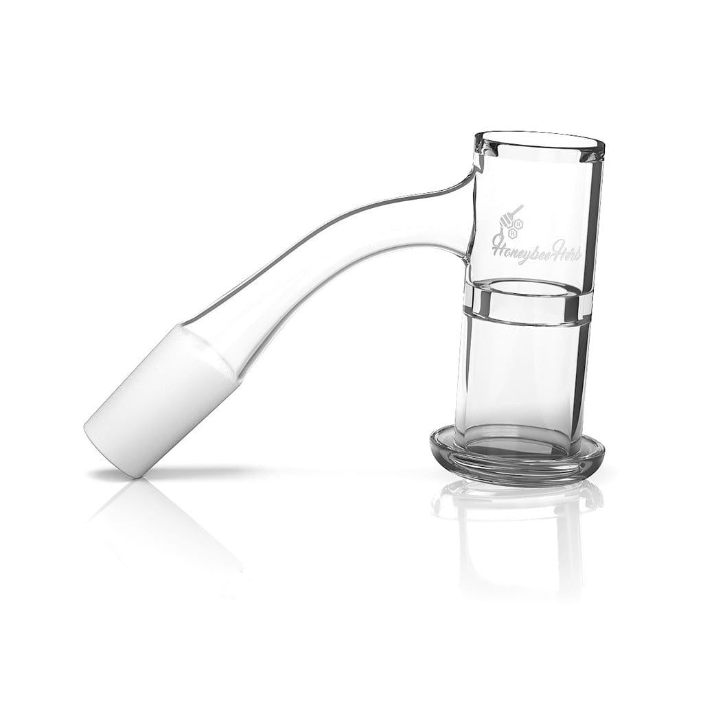 Angled studio shot of a clear Honeysuckle Xl Quartz Banger - 45Â° Degree | Bl resting on white with soft reflections, showing the curved 45° neck and cylindrical bucket.