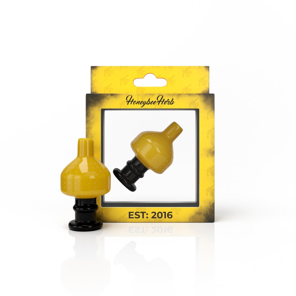 A close-up, angled view of the SWEET BUBBLE CARB CAP, showing the shiny, translucent glass bubble design.
