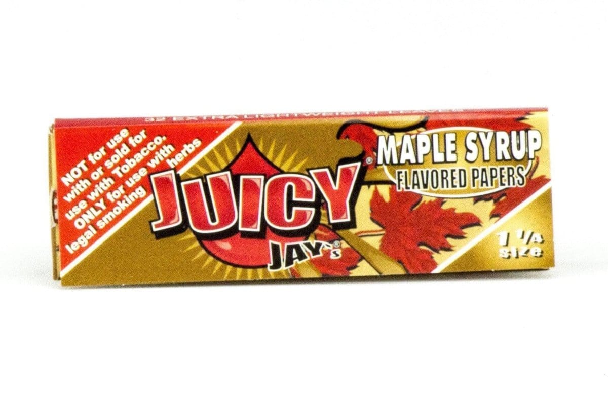 A close-up, angled shot of a package of Classic 1-1/4" Flavored Rolling Papers with bright lettering on a dark background.