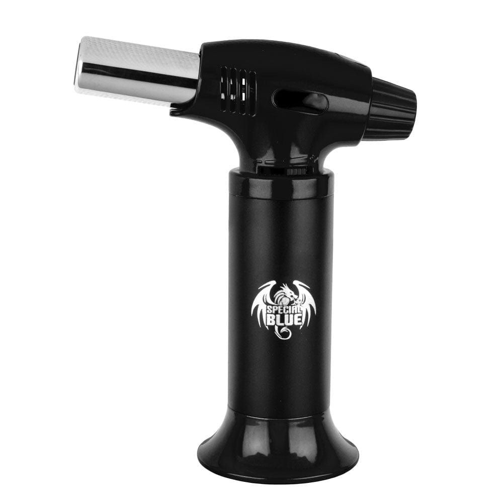 A close-up of the Special Blue Inferno 6.5" Butane Torch, showing its silver and black metal construction in a studio lighting setup.